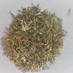 A close-up view of high-quality non-magnetic gold-plated electronic pins, 20 grams, ideal for gold recovery.