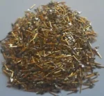 A close-up view of high-quality non-magnetic gold-plated electronic pins, 20 grams, ideal for gold recovery.