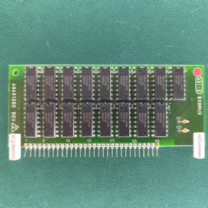 Vintage green PCB with 32 DIP integrated circuits and a through-hole pin connector