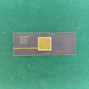 AMD AM29X 305ADC ceramic IC with gold top on green background