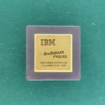 IBM 6x86MX PR233 ceramic CPU with gold top on green background