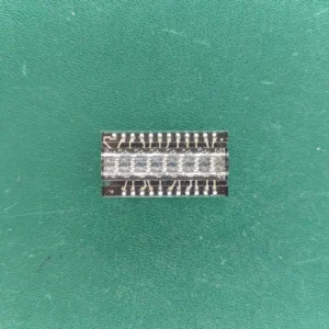 MAN2816 vintage EPROM with transparent ceramic window showing internal die