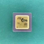 ST Cyrix Cx6x86 P150+ ceramic CPU with gold top on green background