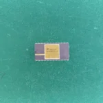 National Semiconductor NS32081D-10J ceramic FPU with gold top on green background