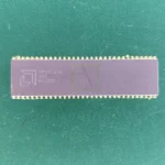 AMD AM29L516 long ceramic DIP IC with gold pins on green background