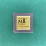 Cyrix MII-v 300GP ceramic CPU with gold top on green background