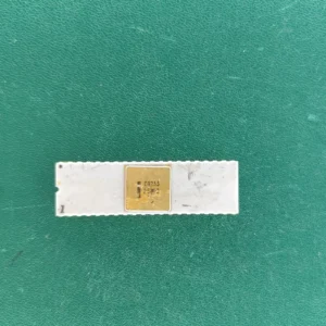 Intel C8255 white ceramic IC with gold top on green background