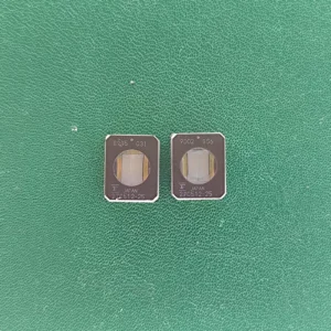 Two 27C512-25 ceramic EPROM IC chips with quartz windows for gold recovery