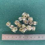 Twenty-five Soviet ceramic IC chips with gold-plated pins for gold scrap recovery