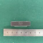 NEC D35H73D vintage DIP IC with ruler for size measurement