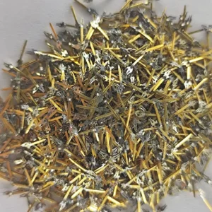 A close-up view of high-quality non-magnetic gold-plated electronic pins, 20 grams, ideal for gold recovery.